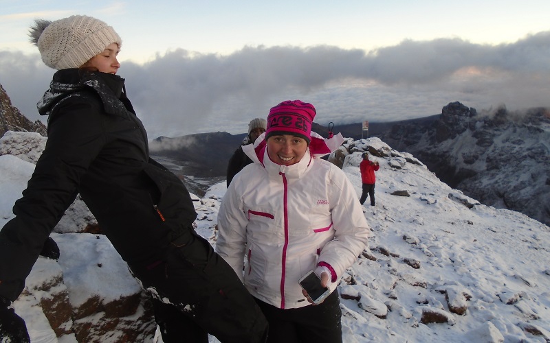 the top of Mount Kenya is very cold with snow on the ground and cold mist