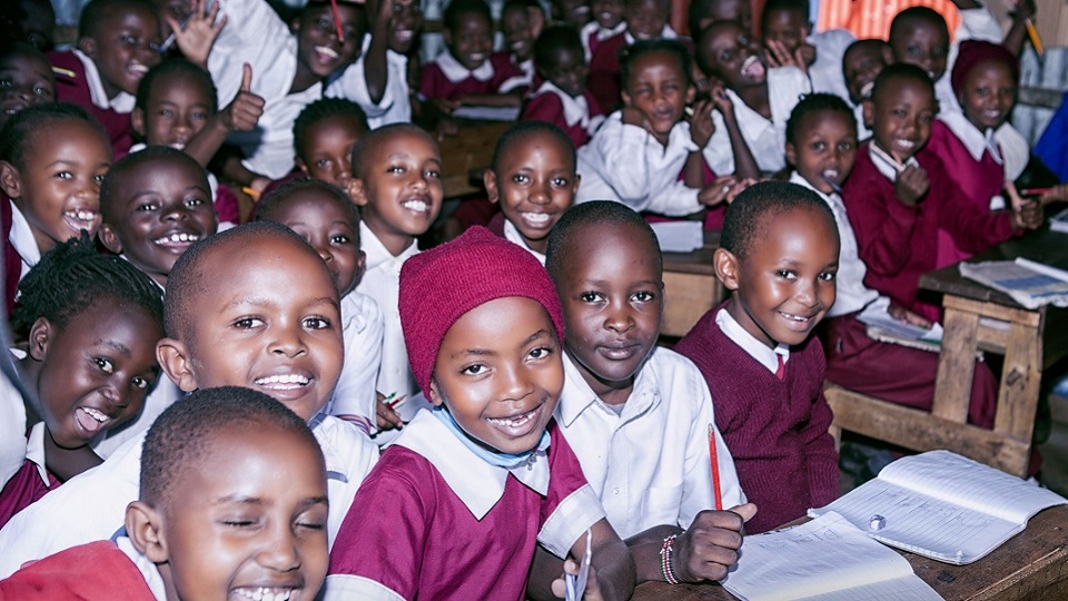 pupils at a Porridge and Rice partner school in the Nairobi slums home to people who are part of the extreme poor